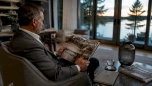 Real estate agent reviewing waterfront property brochures