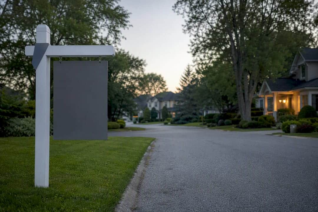 Innisfil residential street with listing post