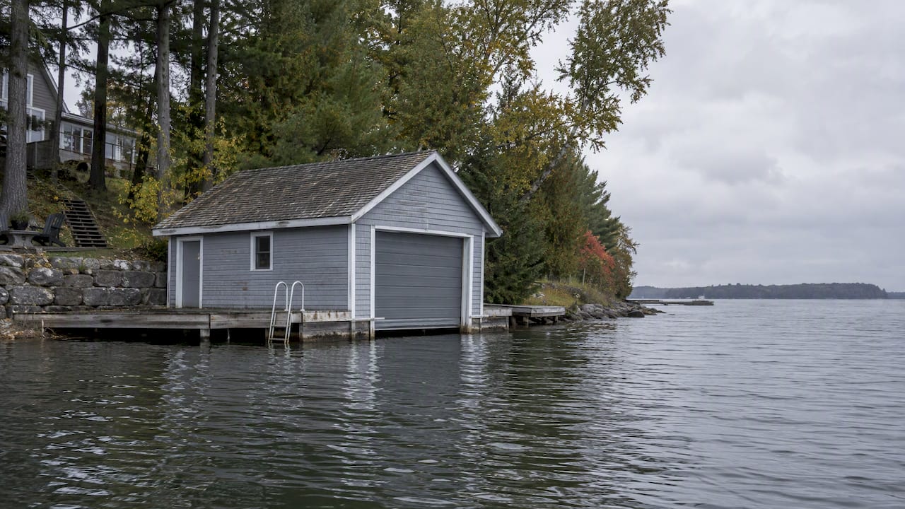 Modest boathouse beside a Lake Simcoe shoreline
